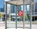 A No Smoking sign at an Australian bus stop, representing common public smoking laws.